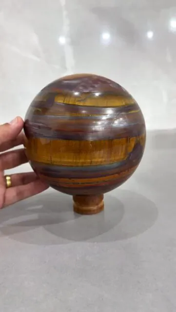 Have you ever seen a Tiger’s Eye sphere this size?
This is the largest Tiger’s Eye sphere I’ve ever seen in person!
With stunning colors and an impeccable polish, this sphere has the power to elevate the level of sophistication of any crystal collection.

#collectioncrystal #tigereye #tigereyecrystal #crystal